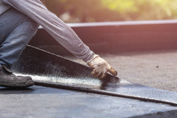 Professional Waterproofing technician working in Erie, MI